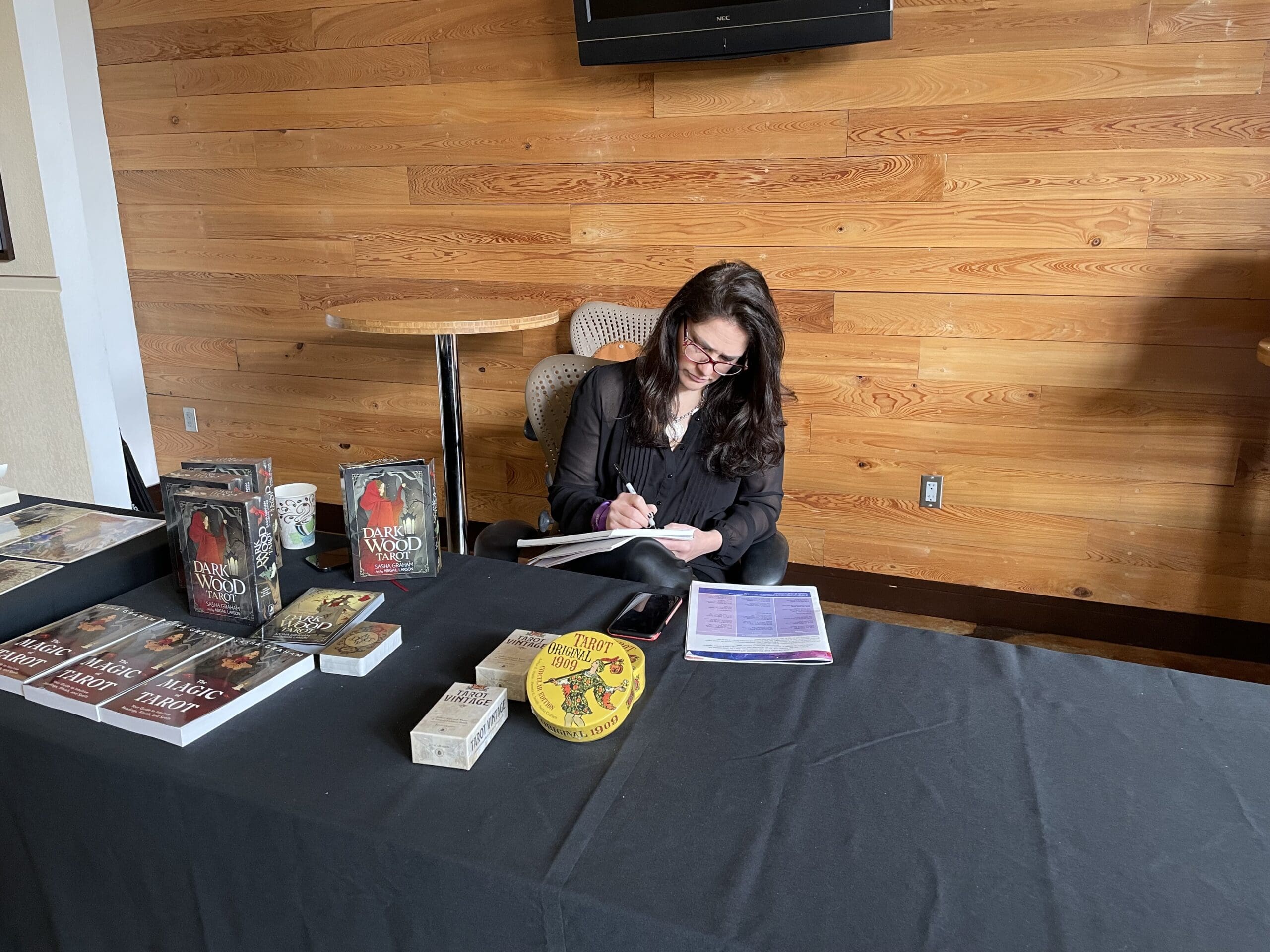 Sasha Graham signing books at StaarCon 2022